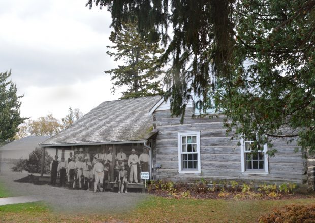 A contemporary photograph of a log golf club house with B&W photo of golfing party superimposed.