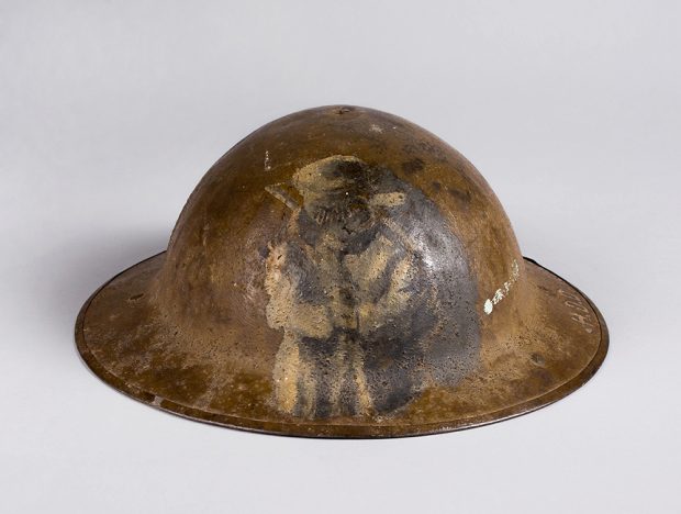 There is an old distressed soldier's helmet