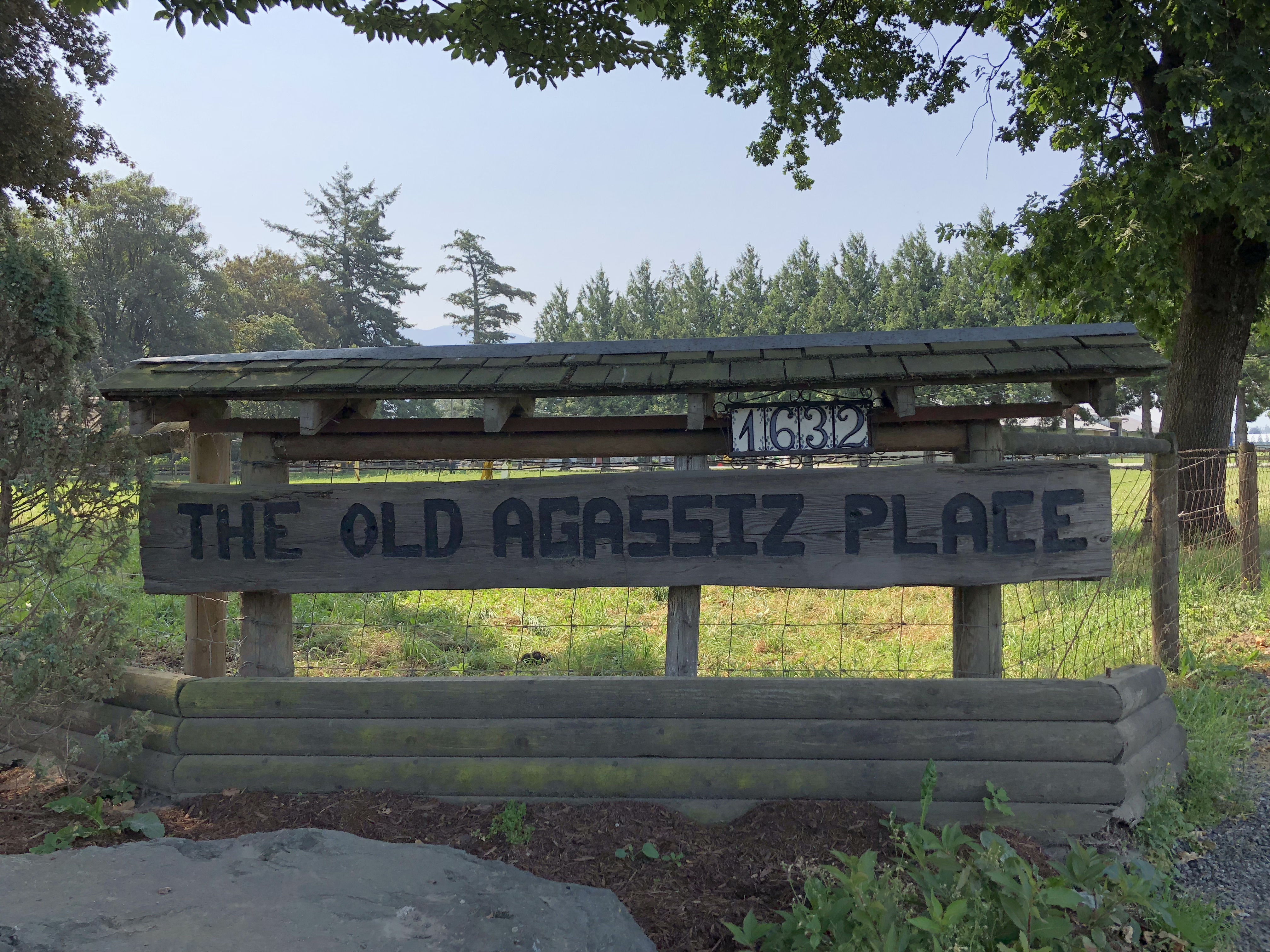 Colour photograph of a wood sign "The Old Agassiz Place."