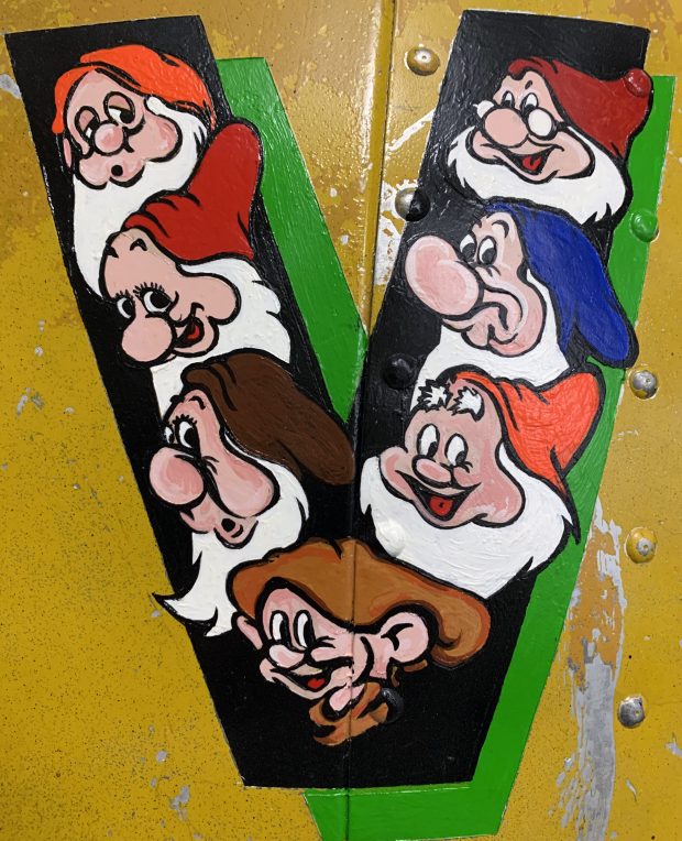 close up of seven dwarfs painting
