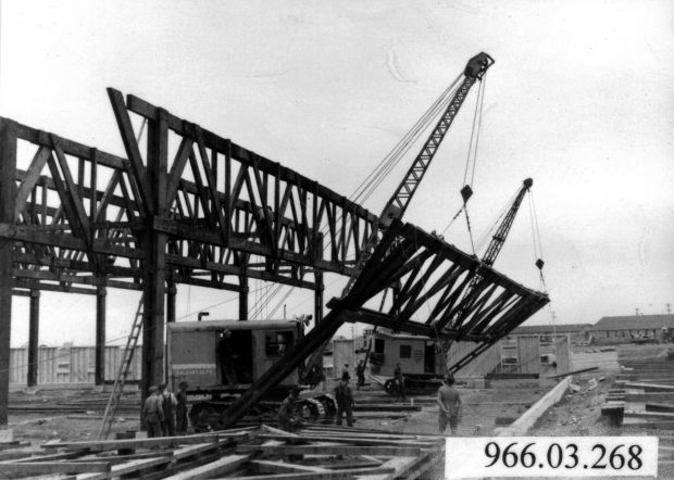 1940s crane working on hangar construction site