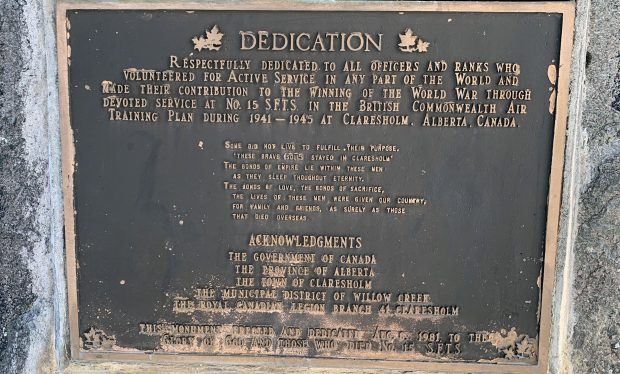 a close up of a bronze sign