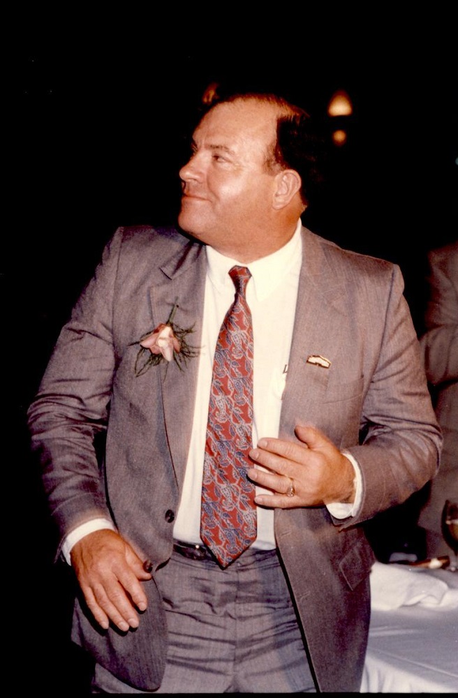 Colour photo of a man in evening attire.