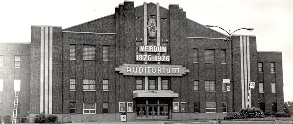 Black-and-white photo of the front façade of a building.