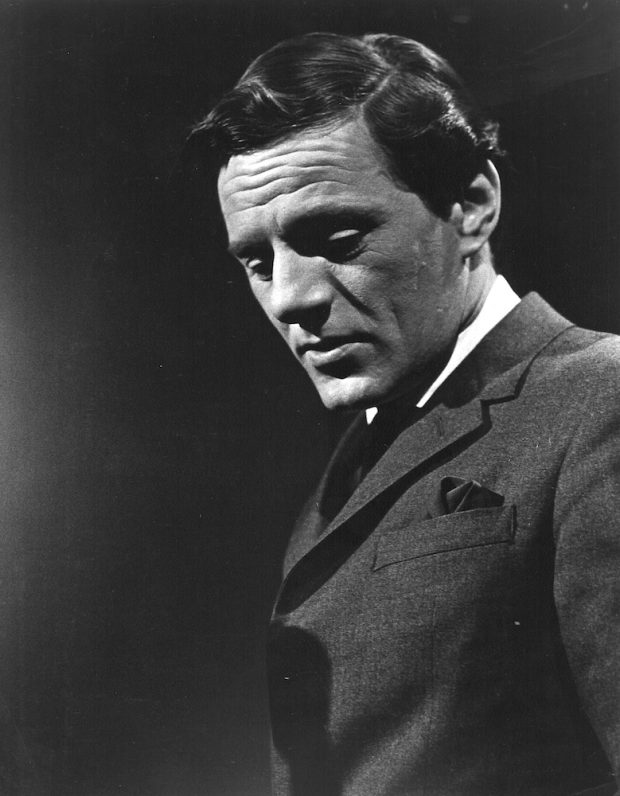 Black and white photo of Claude Léveillée in a suit jacket.