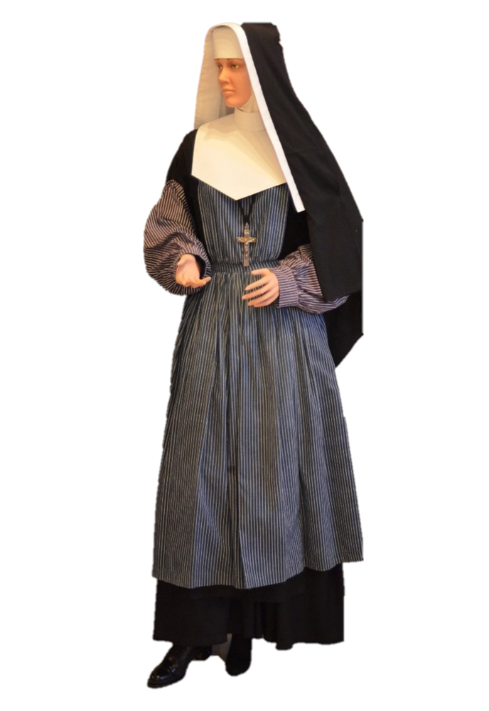 Mannequin wearing a nun’s habit and apron.