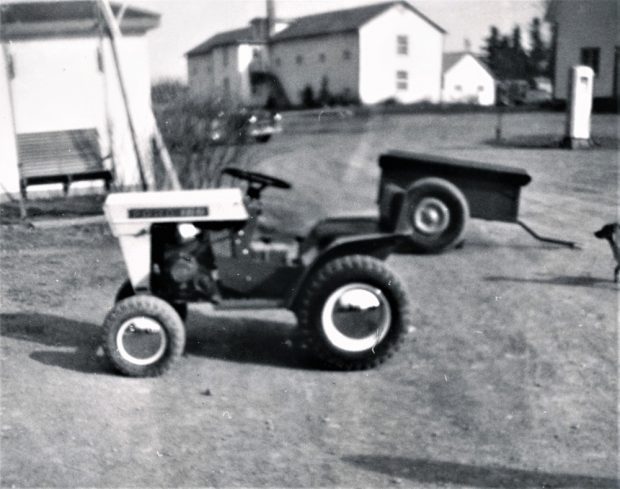 Black and white photo of a small tractor.
