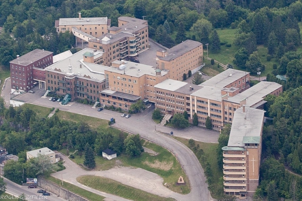 Aerial view of several adjacent buildings.