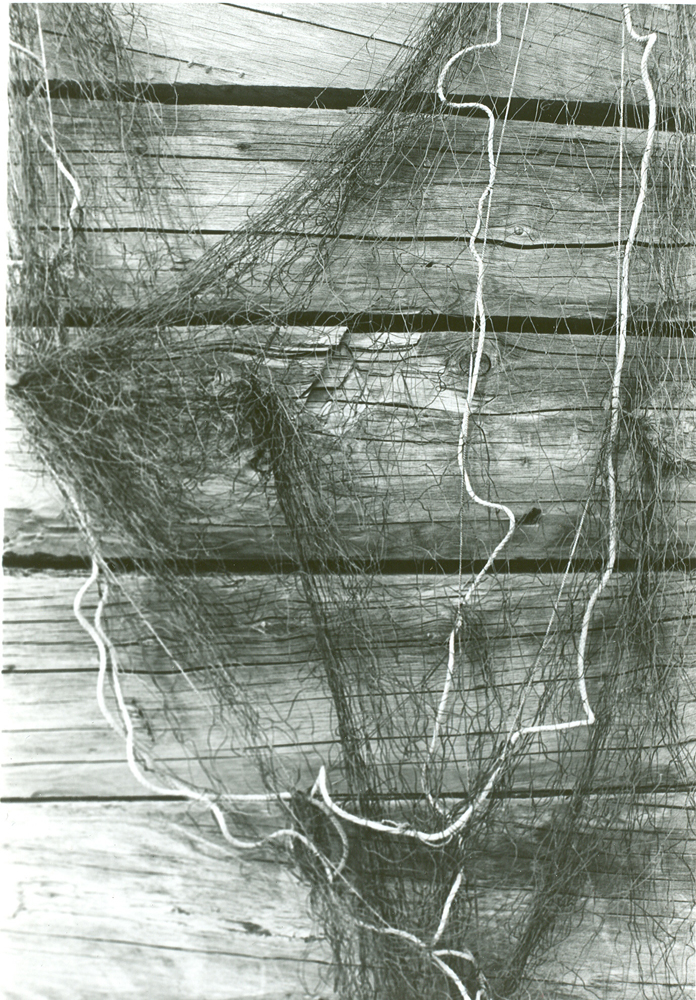 Black and white photo of a fishing net.