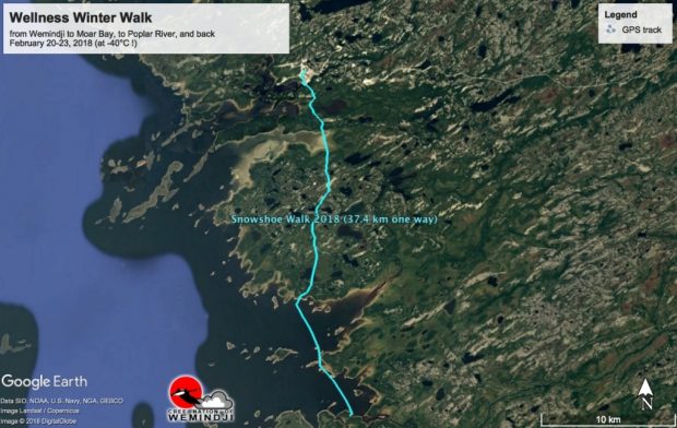 This map, a satellite image of the coast near Wemindji, shows the route walked with a blue line.