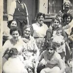 Joseph Charles Sapp stands in the back