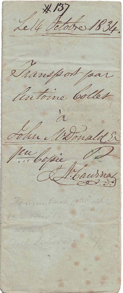 Greenish page of a notarized document written by Joseph-Narcisse Cardinal. There are several stains on the documentand the ink is brownish.