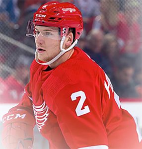 Upper body of hockey player on the ice