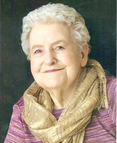 Head and shoulders of woman wearing scarf