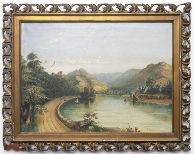 Image of framed riverside scene surrounded by hills, with sailboat and castle to the left of centreed