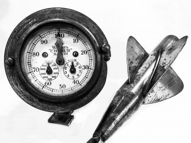 Black and white modern photograph of a taffrail log used to record how fast a ship is travelling through water.