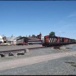 Photo looking northeast towards Main Street from behind railway tracks.