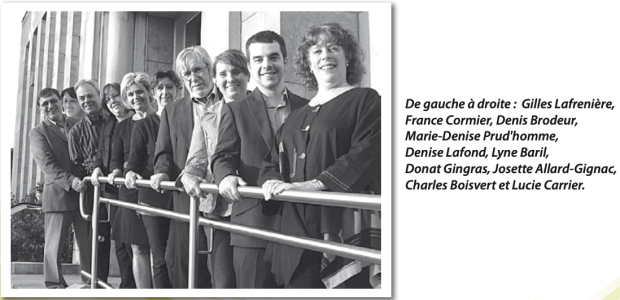 Black and white photograph showing a group of 10 people, four men and six women. They have their hands on a railing outside Shawinigan City Hall.