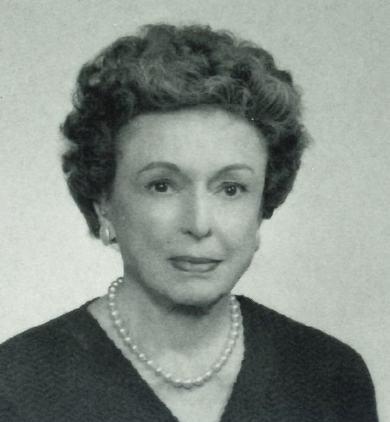 Black and white photo of Eleanor Sweezey wearing a pearl necklace.