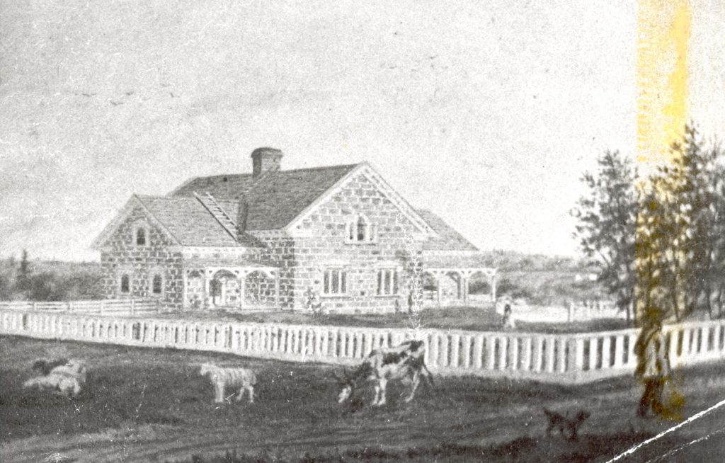 Engraving of the Ferguson Manor House built after 1854. The stone manor house is located roughly in the center of the picture. A white fence delimits the manor's grounds. Outside the fence, a cow and 4 sheep are grazing. A man and his dog are walking along the fence.
