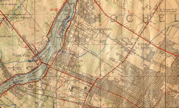 Detail of a topographical map (early 1940s). From left to right: Laval, the Des Prairies River, and the Island of Montreal. The village core of Sault-au-Récollet, at the top centre. Lighter-coloured areas are less urbanized. The villages of Bordeaux, Ahuntsic, Youville, Saint-Michel remain relatively distinct from one another.