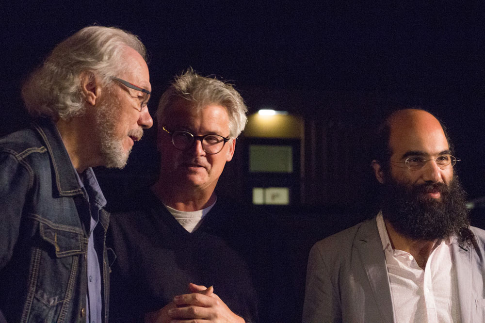 A close-up portrait of poet Jacques Boulerice (left), Clément Canac-Marquis of Concerts Ahuntsic en fugue (centre) and musical composer Kiya Tabassian (right), a few minutes after the first public performance of the Mémoires d’Ahuntsic anthem.