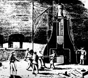 A black and white illustration of four workers stoking the fires of the steam forge drop hammer, while three workers look on. The workers are featured in the foreground of the image with an industrial shop floor as the background.