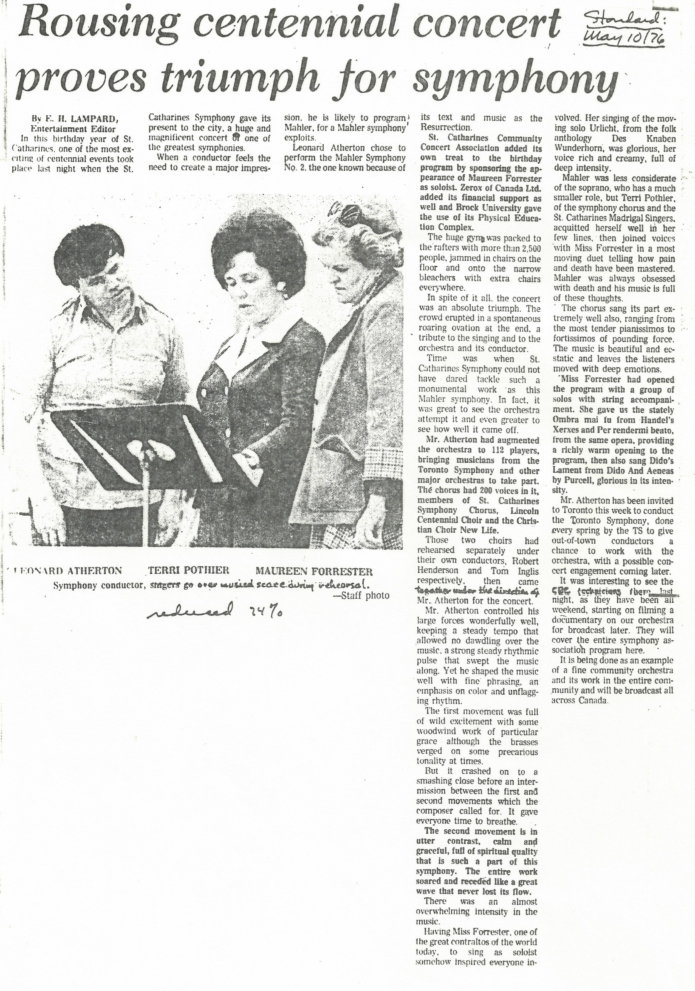 Leonard Atherton, Terri Pothier, and Maureen Forrester look over music on stand. Newspaper article titled "Rousing centennial concert proves triumph for symphony"