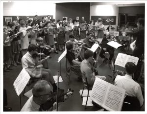 Choir and orchestra in rehearsal