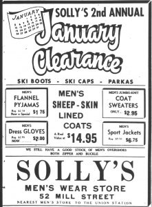 Newspaper advertisement – “Solly’s 2nd annual January Clearance” with prices for pyjamas, gloves, sweaters and sheep-skin lined coats.