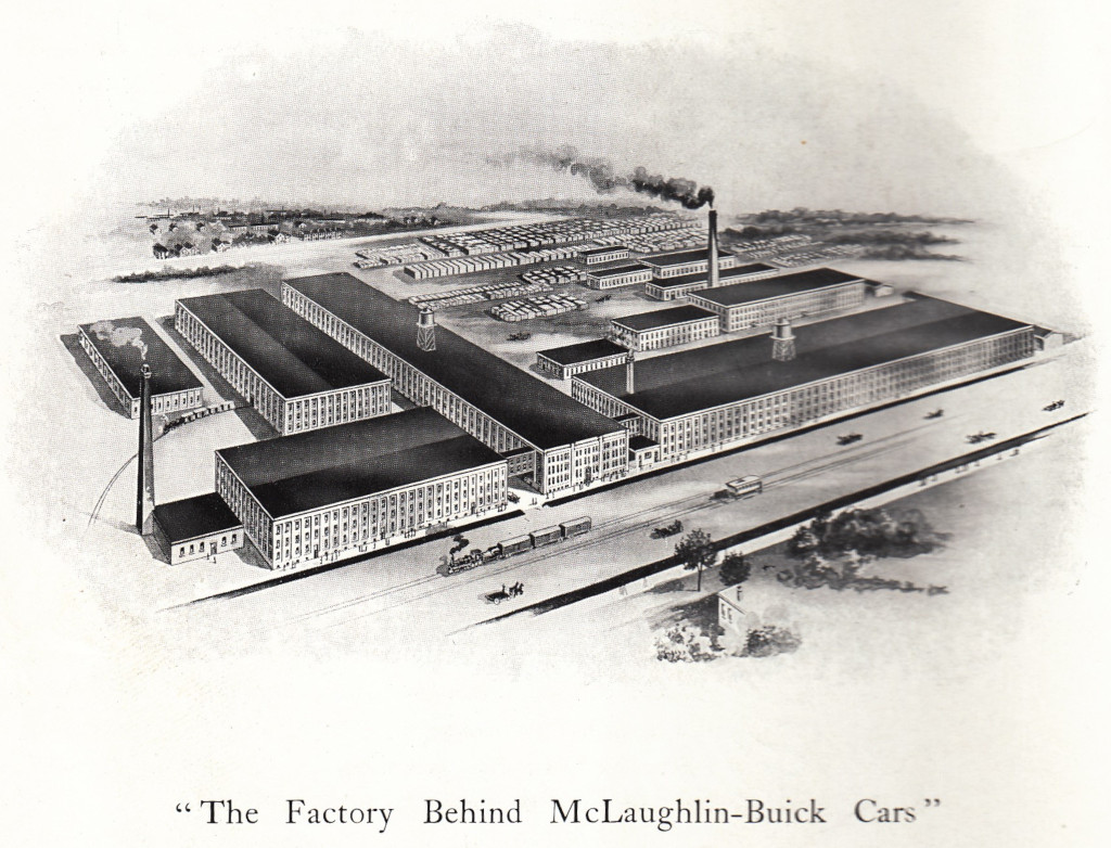 A black-and-white painting depicting 9 small and 4 large factory buildings. The buildings are placed next to two rail lines and a lot full of shipping containers. Two smokestacks are visible. The caption reads The Factory Behind McLaughlin-Buick Cars.