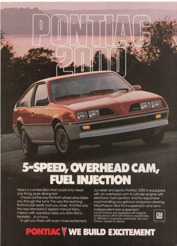 A colour magazine ad showing a sportscar in a wooded environment. Caption: PONTIAC 2000 5-SPEED, OVERHEAD CAM, FUEL INJECTION