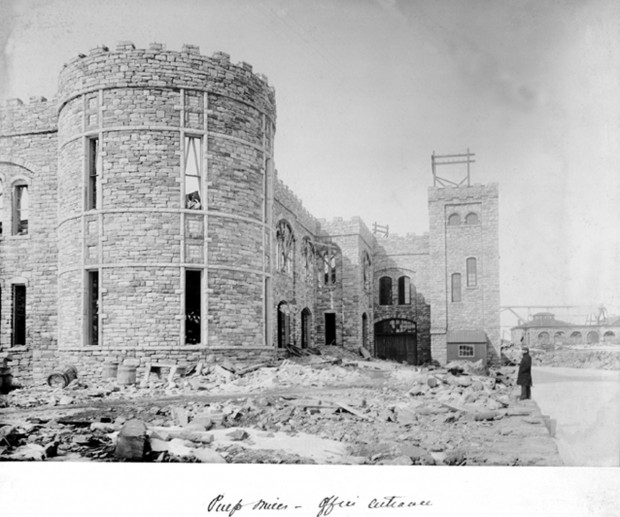 Sandstone tower of pulp mill. Black and white photograph.