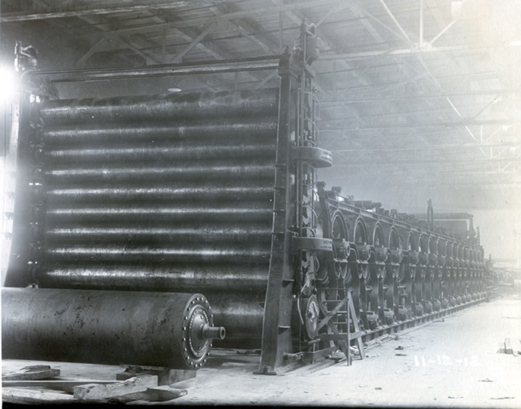 Roller machine disassembled in paper mill building