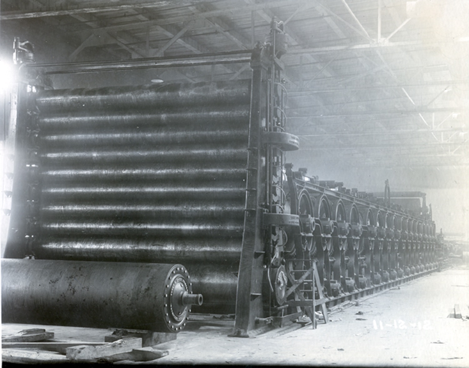 Roller machine disassembled in paper mill building