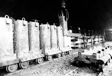 Train car carrying steel blocks