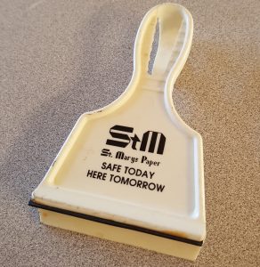 An ice scraper from St. Mary's Paper that reads, Safe Today: Here Tomorrow