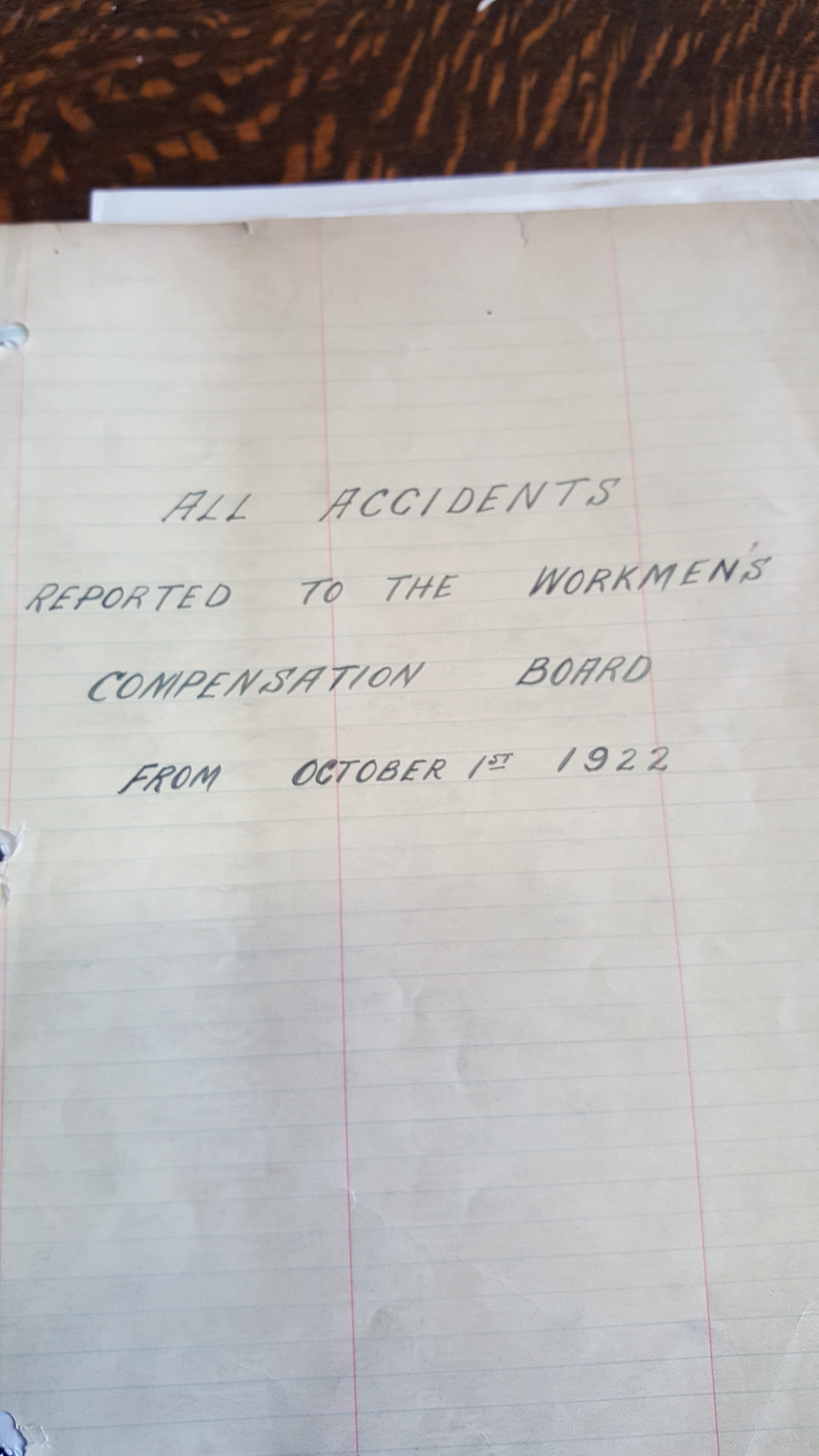 A handwritten note on a lined piece of paper. It reads, all accidents reported to the workmen’s compensation board from October 1st 1922.