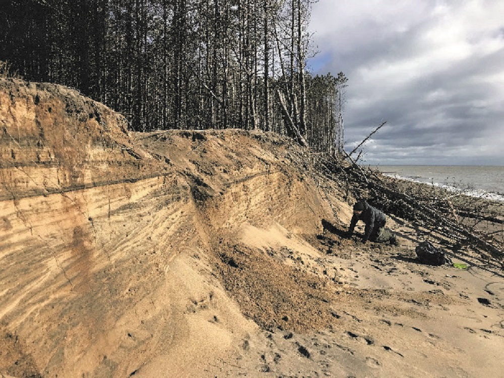 Sand bank destroyed by erosion