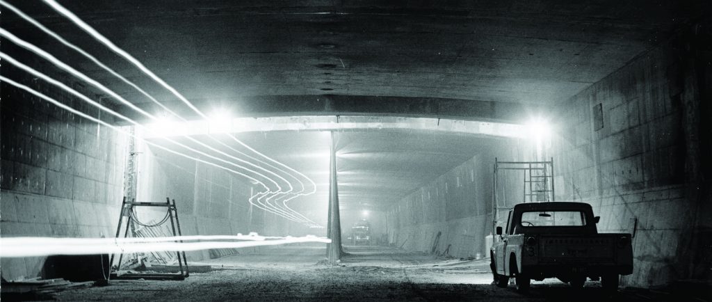 A truck parked inside a tunnel