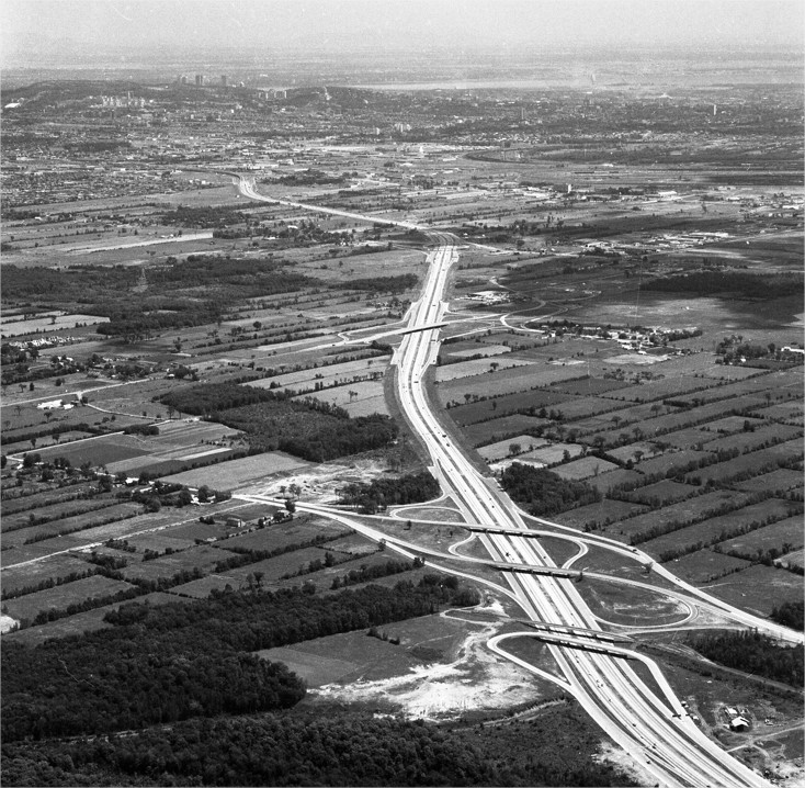 A highway running through agricultural land