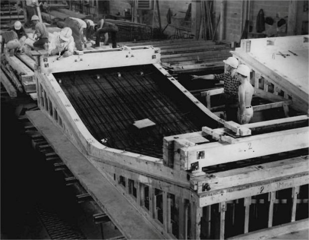 Workers constructing panels