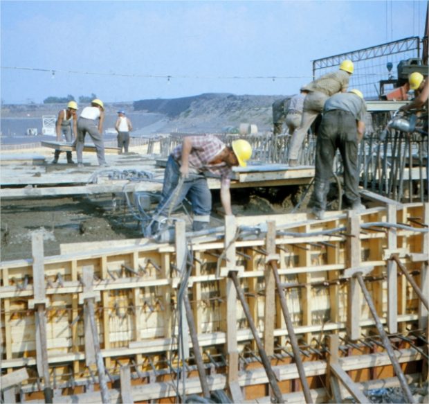 Construction workers on a structure