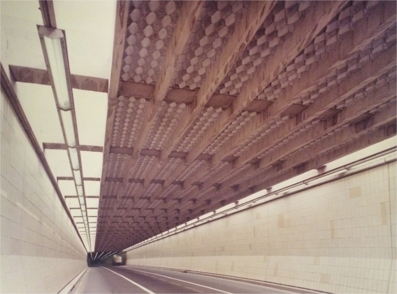 A truck going through a tunnel