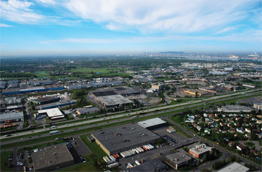 Industrial buildings separated by a highway