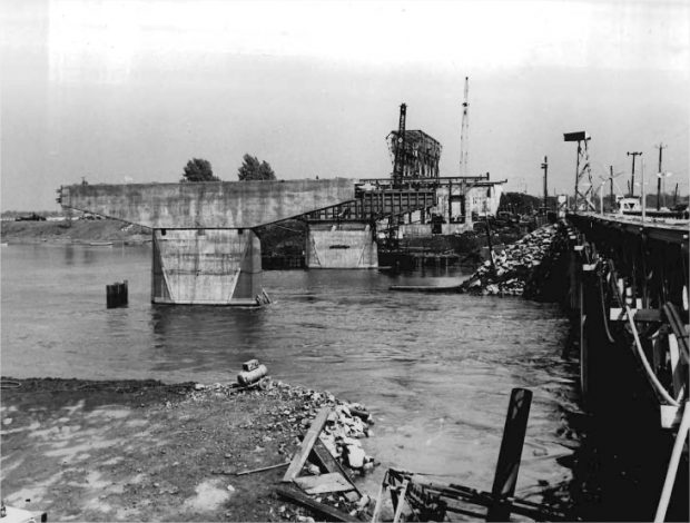 Bridge pillars being built on a river