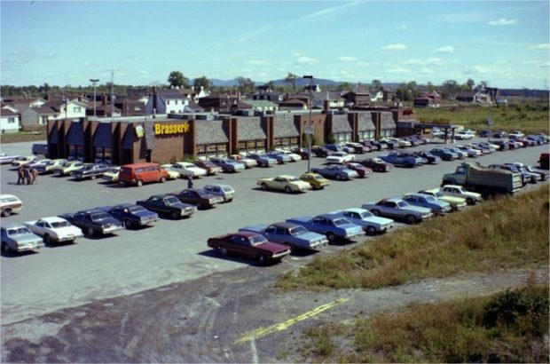 Cars parked in front of a commercial building
