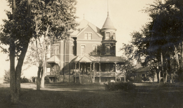 A large house with many trees