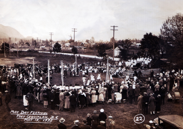 Three groups of children performing the May Pole dance