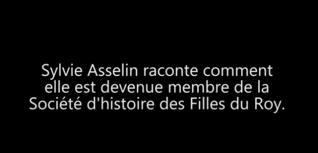 White text on black background: Sylvie Asselin, a member of Société d'histoire des Filles du Roy, takes on the role of Marthe Quitel. The members of this historical society impersonate New France’s pioneering women.